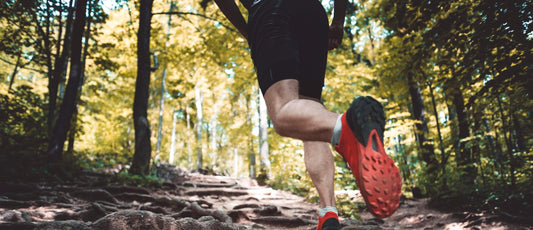 Athlete contemplating the best way to speed up muscle recovery after a workout.